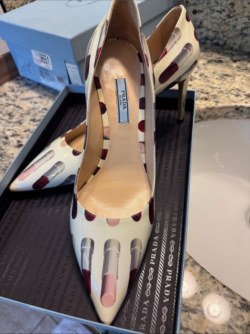 Prada Cream Pointed-Toe Pumps with Lipstick Motif 40.5